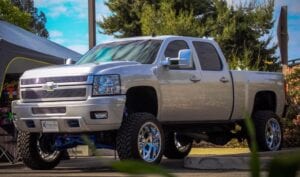 Custom-lifted gray pickup truck